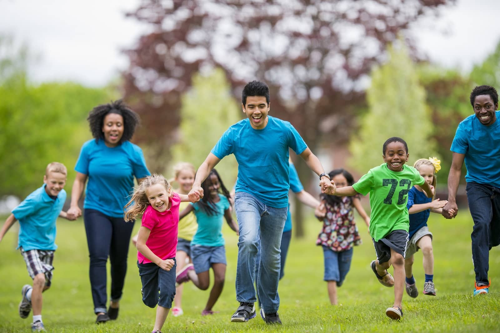 Kids and adults running