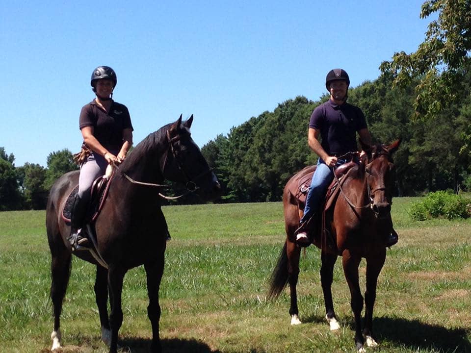 Two horse riders