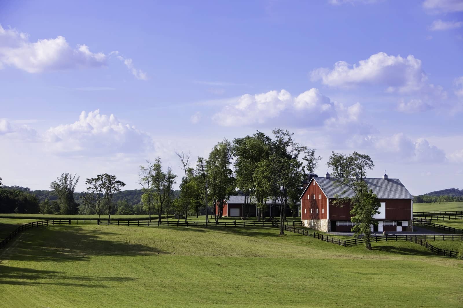 Red barn with fence