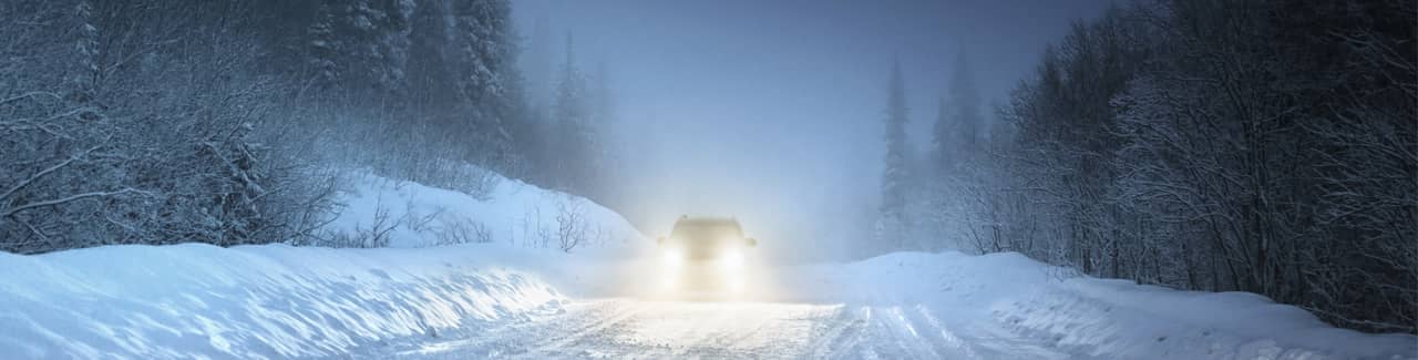 Car driving in snow